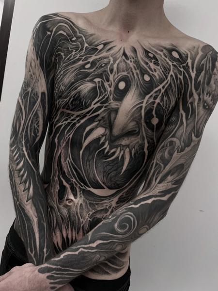 Blackwork abstract creature tattoo by @kinezos_qq