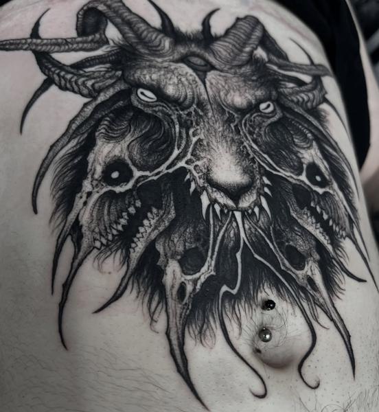 Blackwork demonic goat tattoo by @kinezos_qq