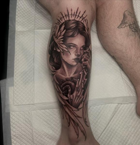 Realism woman with heart tattoo by @kira_ludwig_tattoos