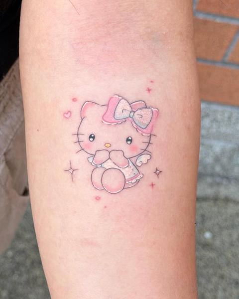 Anime hello kitty angel tattoo by @koibitotattoo