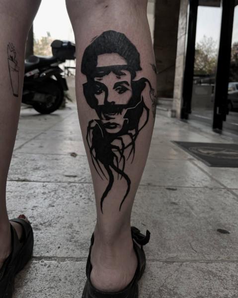 Blackwork abstract portrait tattoo by @kona_trv