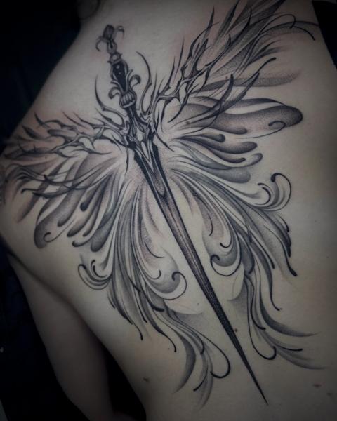 Blackwork sword wings tattoo by @zzirini