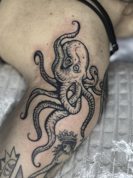 Blackwork octopus tattoo by @konna.aesthetics