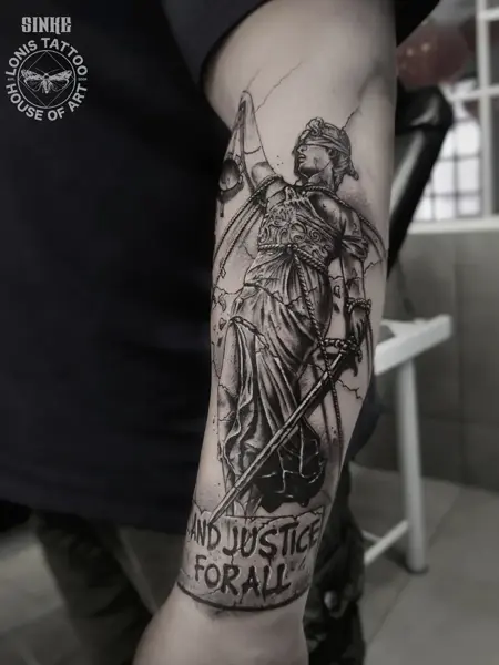 Realism lady justice tattoo by @sinke_