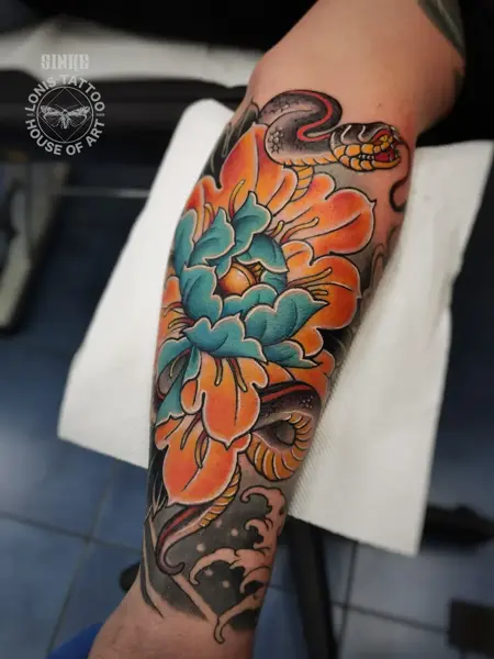 Japanese snake and flower tattoo by @sinke_
