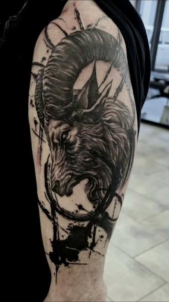 Realism ram head tattoo by @korneltattoo