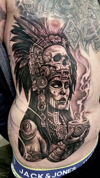 Realism aztec warrior tattoo by @korneltattoo