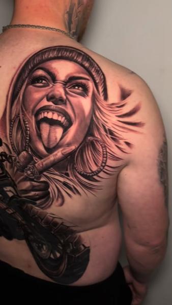 Realism portrait with motorcycle tattoo by @korneltattoo