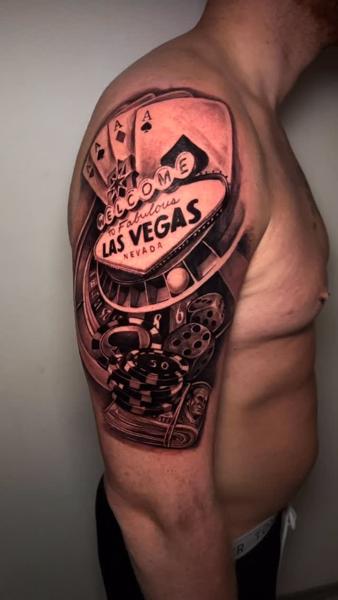 Realism las vegas theme tattoo by @korneltattoo