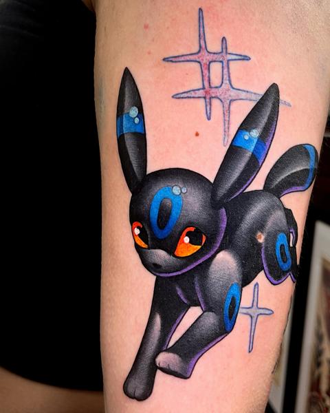 Anime cartoon creature tattoo by @klark_tattoo