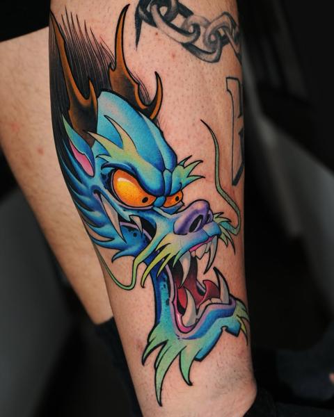 Neo-traditional colorful dragon tattoo by @klark_tattoo