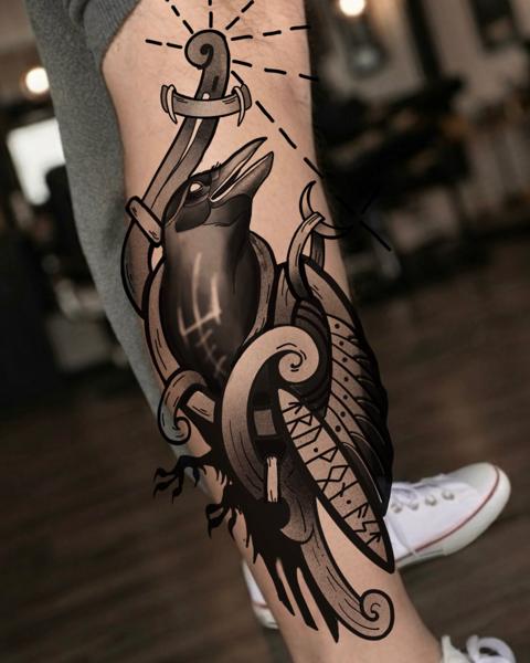 Blackwork raven dagger tattoo by @koval.ink