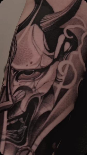 Blackwork samurai mask tattoo by @koval.ink