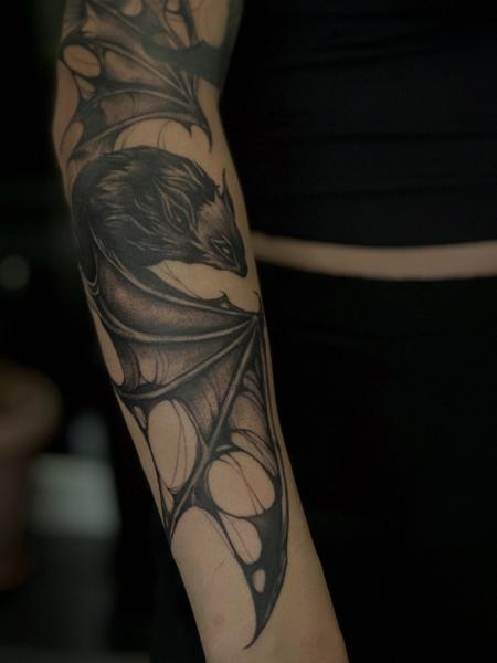 Blackwork bat tattoo by @koval.ink