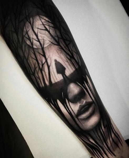 Dark realism dripping face forest tattoo by @kriswilson_ink