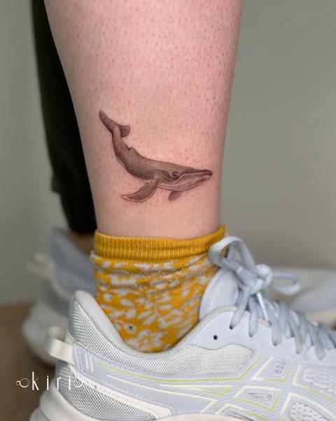 Fine line whale tattoo by @kiri.vrs
