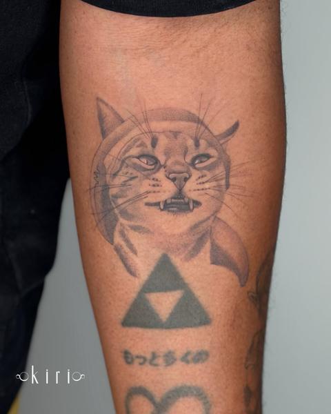 Realism angry cat tattoo by @kiri.vrs