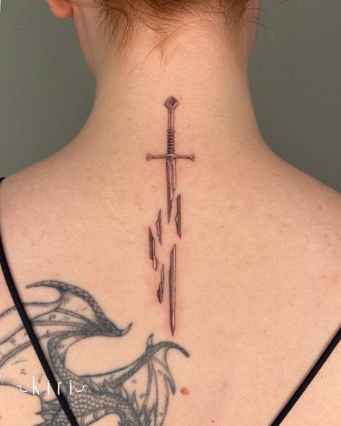 Fine line sword tattoo by @kiri.vrs