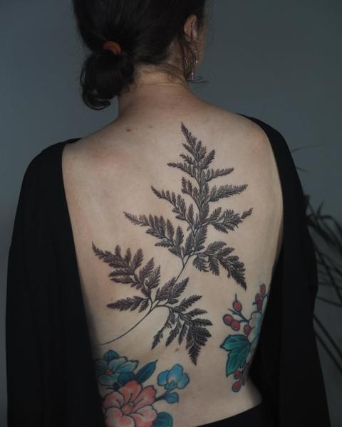 Botanical fern branch tattoo by @lionoflauratattoos