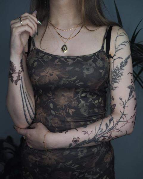 Fine line floral sleeve tattoo by @lionoflauratattoos