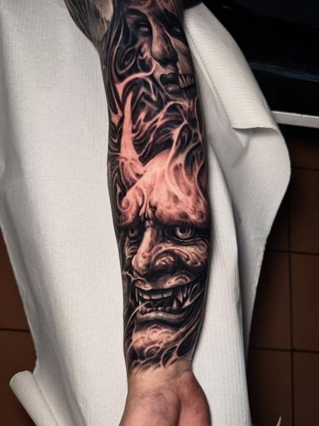 Realism demonic face tattoo by @lazaros_brone