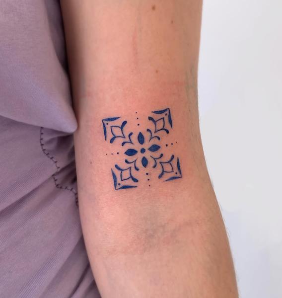 Ornamental geometric tile tattoo by @deyatatts