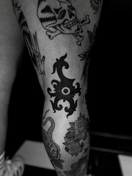 Tribal tribal symbol tattoo by @leeregantattoo