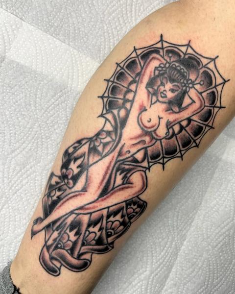 Traditional pin-up girl tattoo by @no.karate.in.the.pit