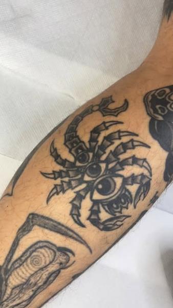 Blackwork abstract scorpion tattoo by @no.karate.in.the.pit