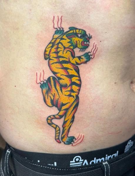 Traditional climbing tiger tattoo by @no.karate.in.the.pit