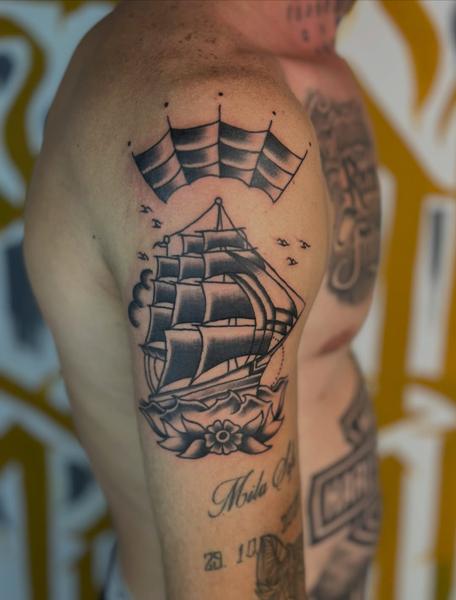 Traditional sailing ship tattoo by @no.karate.in.the.pit