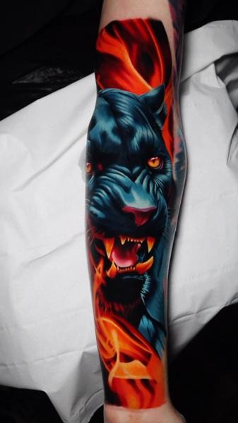 Realism panther tattoo by @lennoxtattoo