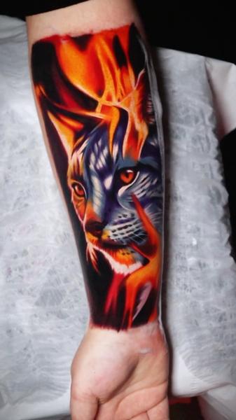 Realism fiery cat tattoo by @lennoxtattoo