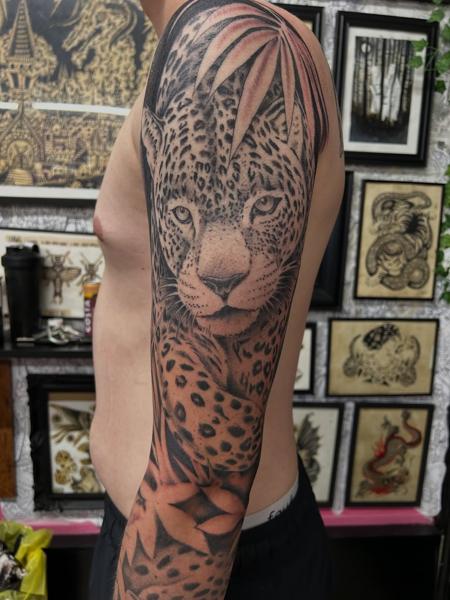 Realism jaguar portrait tattoo by @ashestattoo