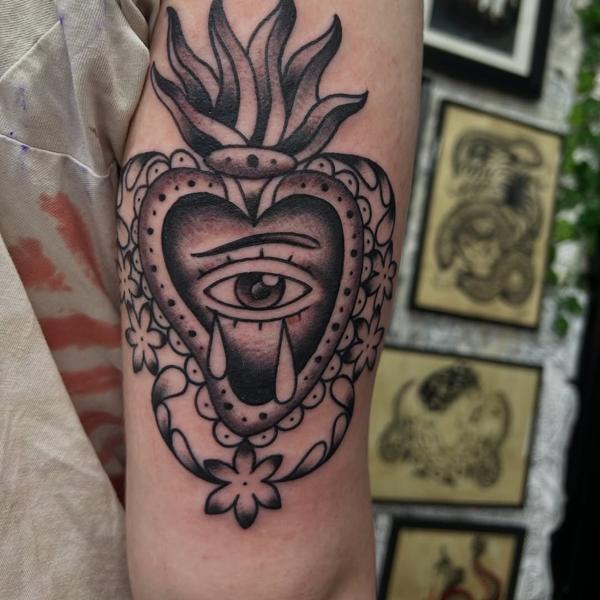 Neo-traditional flaming sacred heart tattoo by @ashestattoo