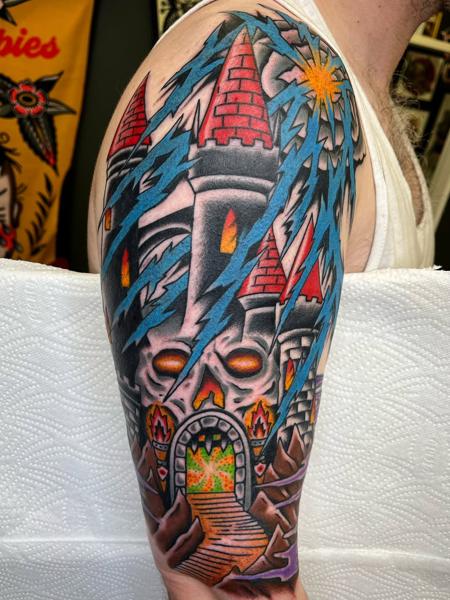 Traditional castle with lightning tattoo by @lewismckechnie