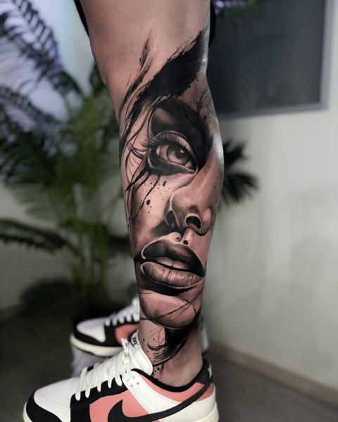 Realism abstract face tattoo by @ladylia_art