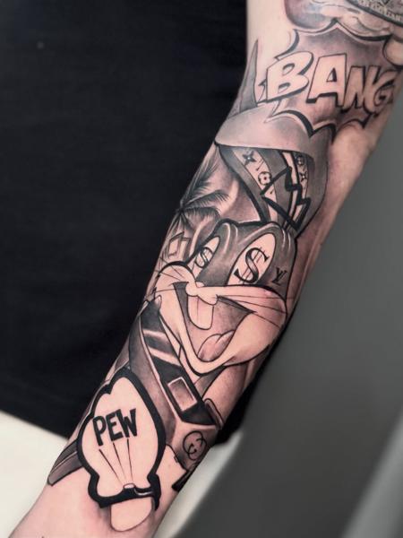 Illustrative cartoon character tattoo by @ladylia_art