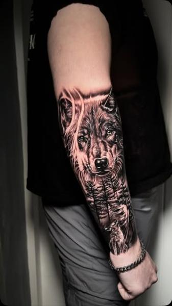 Realism wolf portrait tattoo by @liamctattoos1