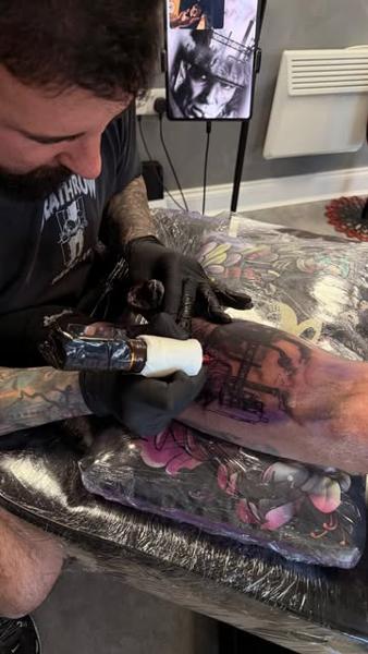 Realism cityscape tattoo by @liamctattoos1