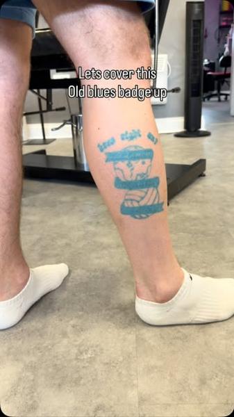 Traditional blues badge tattoo by @liamctattoos1