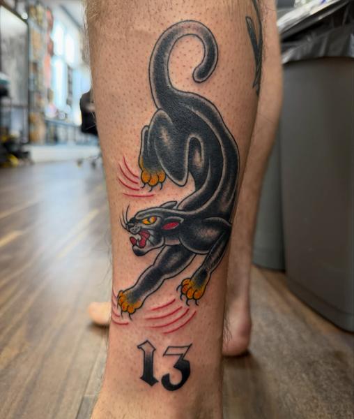 Traditional panther tattoo by @shedwolf