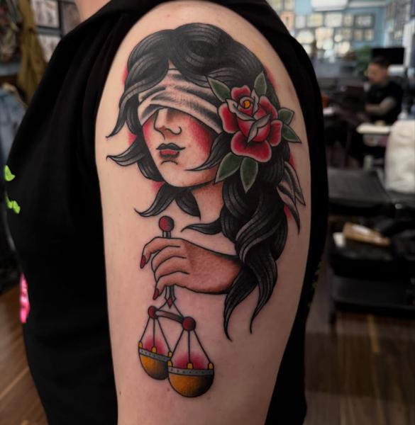 Traditional blindfolded woman tattoo by @shedwolf
