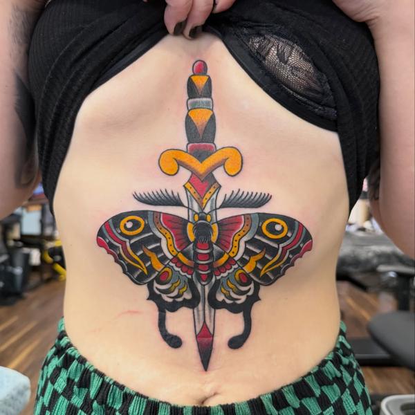 Traditional dagger moth tattoo by @shedwolf