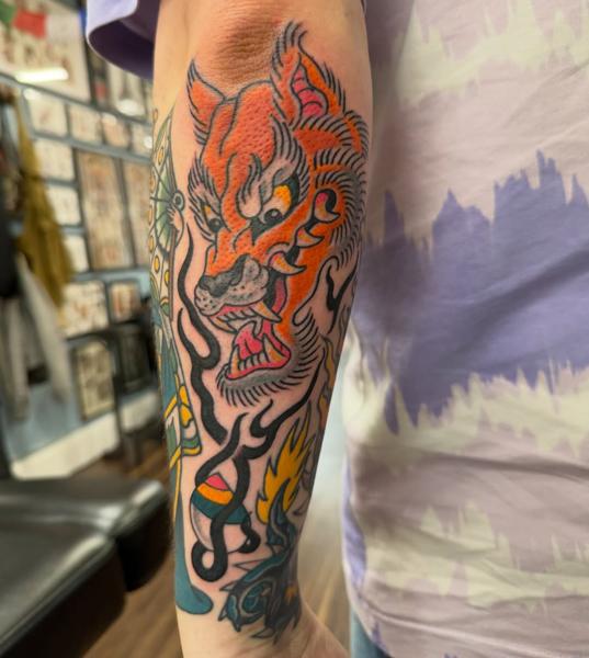Traditional tiger head tattoo by @shedwolf