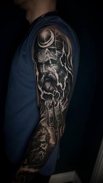 Realism mythical god tattoo by @ozkotattooart