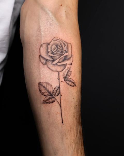 Realism rose tattoo by @libertyctattoo