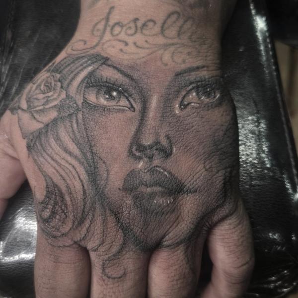 Realism portrait with rose tattoo by @lilroytattoos