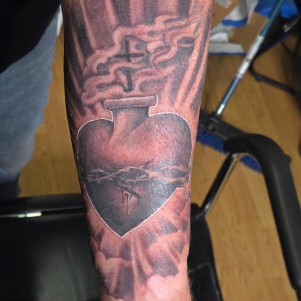 Black And Grey sacred heart tattoo by @lilroytattoos