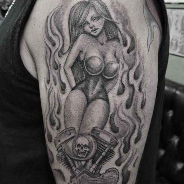 Black And Grey pin-up flames tattoo by @lilroytattoos